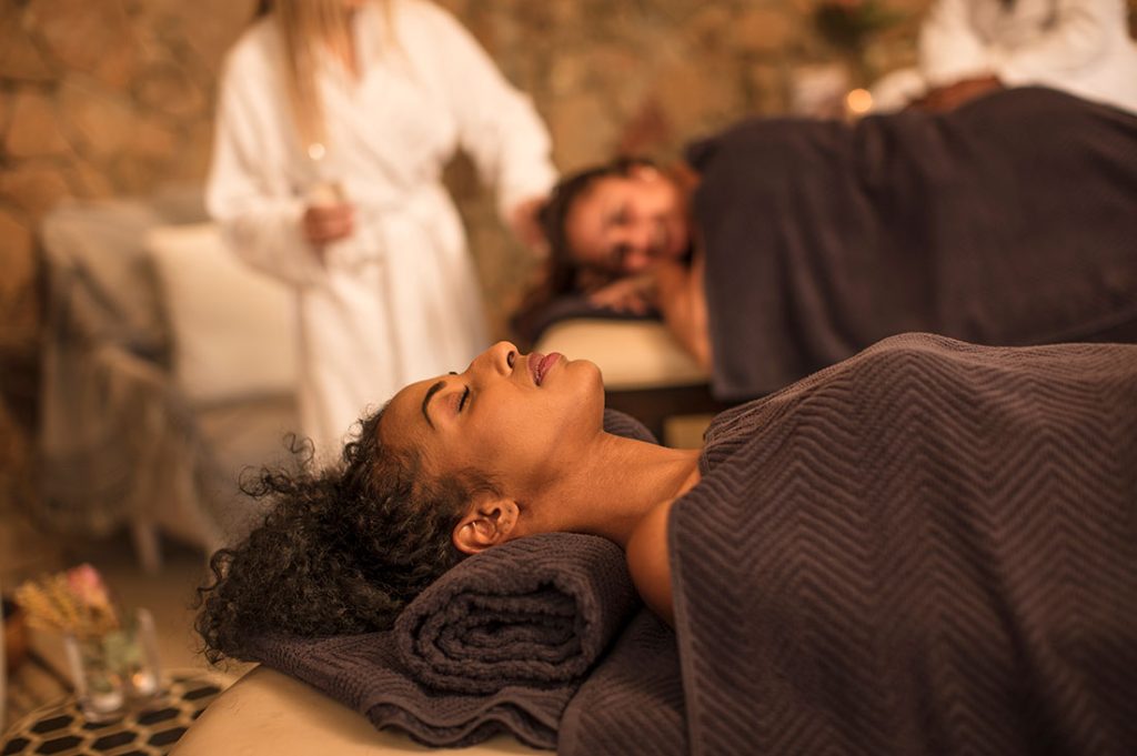 woman-relaxing-on-lounge-in-a-spa-9VZMNYN.jpeg